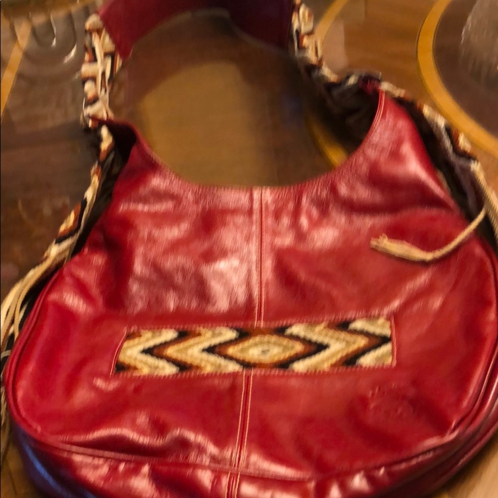 Like new, Leather messenger bag with woven details